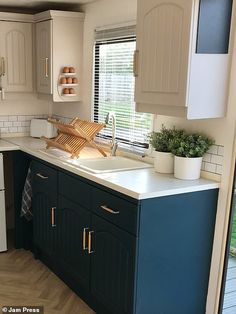 the kitchen is clean and ready for us to use in its new owner's home