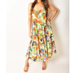 This Bright And Funky Maxi Dress Features A Tiered Skirt And Adjustable Straps For An Easy, All-In-One Look. Model Is 5'5" And Wears A Size S. 100% Rayon True To Size Sleeveless Multicolor Midi Dress With Tropical Print, Sleeveless Multicolor Tropical Print Midi Dress, Tropical Midi Dress With Tropical Print, Tropical Multicolor Midi-length Maxi Dress, Vibrant Midi-length Vacation Dresses, Vibrant Midi Length Vacation Dresses, Summer Tropical Print Midi Dress, Tropical Midi Dress With Vibrant Print, Tropical Multicolor Midi Dress For Day Out