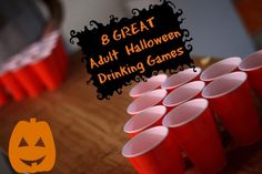 there are 8 cups on the table for halloween drinking games to play with friends and family