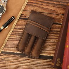 Genuine Leather Pen Case For Business Remarkable Leather Pen Holder Retro Stylus Case Writing Pen Pocket Bag Carry out PRODUCT INFORMATION MATERIALS: Made OF 100% Crazy Horse Leather Size&Weight: ▶Height: 15.5cm (6.1 inch) ▶Width: 8.6cm (3.4 inch) ▶Depth: 2cm (0.8 inch) ▶Weight: 49g ☞All dimensions are measured manually with slight deviation. Thank you for your understanding. My Other Style Leather Pen Cases:  1 Slots: https://etsy.me/3RHAfE1 2 Slots: https://etsy.me/3RPV6oP ✍From quills to pens to stylus, no matter how the world changes, every era needs a pen. For us, the pen is not just a tool, but a friend as well. It accompanied us through the difficulties and recorded our ordinary daily life. We hope to protect these friends and provide them with a comfortable home. ✎FEATURES ▶The ext Brown Pencil Case Pouch With Pen Slots, Brown Travel Pencil Case With Pen Holders, Brown Organizer With Pen Slots For Daily Use, Rectangular Organizer With Pen Slots For Gift, Rectangular Organizer With Pen Slots As Gift, Brown Rectangular Organizers With Pen Slots, Rectangular Organizers With Pen Slots As Gift, Brown Rectangular Organizer With Pen Slots, Travel Pencil Case With Card Slots