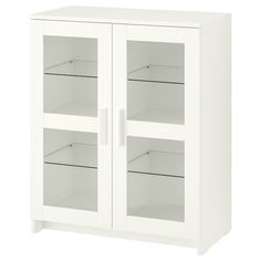 a white cabinet with glass doors and shelves