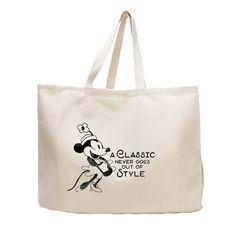 Step aboard a nostalgic journey every time you sling this Steamboat Willie Tote over your shoulder. Celebrating the iconic debut of a beloved character since 1928, this tote is a timeless piece for any fan who appreciates the classics. Crafted from a durable 10-ounce, 100% cotton twill, its built to withstand the bustle of daily errands, leisurely day trips, or even an impromptu picnic by the riverside. With its expansive dimensions of 15"h x 20"w x 5"d, and approximately 1,500 cubic inches of s Steamboat Willie, Steam Boats, Cartoon Design, Out Of Style, Cloth Bags, Handbag Accessories, Day Trips, Tote Handbags, Timeless Pieces