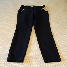 Michael Michael Kors Skinny Leg Dress Pants Size 8 Color New Navy Michael Michael Kors Nwt New Navy Basics Skinny Leg Dress Pants. Front Slant Pockets With Zipper. Front Zipper With Gold Button.Closure. Waistband With Belt Loops. Two Back Pockets. Measurements Laying Flat Waist About 16” (Side To Side) Rise About 10” Inseam About 29 1/2” Leg Opening About 6” (Side To Side) 97% Cotton 3% Elastane Machine Wash Bag 49 Ankle-length Workwear Pants With Button Zip Fly, Ankle-length Work Pants With Button Zip Fly, Stretch Pants With Button Zip Fly For Work, Stretch Work Pants With Button Zip Fly, Fitted Blue Pants With Button Zip Fly, Stretch Pants For Work, Wash Bag, Gold Zipper, Wash Bags