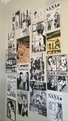 a wall covered in black and white posters