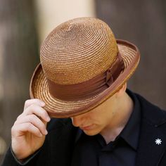 Straw bowler  Classic bowler hat made in 7/8 milimeters brown straw braid. Adorned with an excellent 50 millimeters wide brown grosgrain ribbon and finished with a bow to the right of the hat. CUSTOM HAT OPTIONS: 1- You can choose between a grosgrain ribbon inside or a genuine leather inner sweatband. 2- You can choose the color of your hat from our straw color chart. Just write a brief note when you place the order. 3- I usually use the most accurate color of grosgrain ribbon for each straw color, however if you want you can choose your favorite color from my grosgrain color chart. Just write a brief note when you place the order. Measurements in centimeters are 30 x 27. Crown height 12. Brim length 6. These measurements may have some slight variation depending on the size of the hat. For Brown Straw Hat With Short Brim, Brown Short Brim Straw Hat, Fitted Brown Straw Sun Hat, Short Brim Brown Straw Hat, Brown Straw Boater Hat With Short Brim, Fitted Brown Boater Hat For Kentucky Derby, Brown Straw Boater Hat For Kentucky Derby, Kentucky Derby Brown Straw Boater Hat, Fitted Brown Boater Hat For Spring