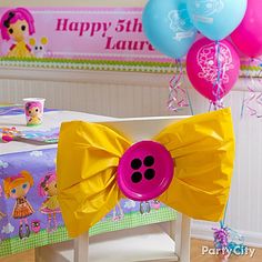 a birthday party with balloons and decorations