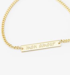 Who says subtle can't be powerful? The small bar bracelet keeps your reminder short and sweet on this polished piece of minimal thoughtfulness. Personalized Yellow Gold Rectangular Name Bracelet, Personalized Rectangular Yellow Gold Name Bracelet, Personalized Rectangular Chain Bracelet For Everyday, Gold Rectangular Name Bracelet For Everyday, Everyday Gold Rectangular Name Bracelet, Minimalist Personalized Rectangular Chain Bracelet, Everyday Gold Nameplate Chain Bracelet, Gold Rectangular Name Bracelet, Gold Nameplate Chain Bracelet For Everyday Wear