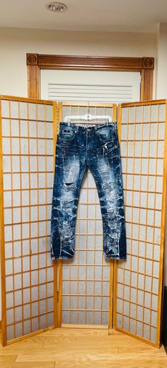 "An AWESOME OOAK pair of 1990s denim jeans!  These punk streetcore jeans are incredible. The jeans are surface distressed & paint-splattered in yellow / white / red paint drips.  I got soooooooo many compliments on these every time I wore them. Honestly hard to part with these -- but it's time for someone else to glow up in them. :)  Great for many specific styles: punk | streetcore | artists | artistic | alt | rave | raver | goth | grunge | stage | industrial  Great for festivals, raves, everyday wear, campus, school, etc.  Of course they're gender neutral: anyone could rock these jeans.  They'd look amazing in a fashion or band photoshoot too.  In excellent condition. A heavy weight well-made pair of denim jeans.  Unisex adult / gender neutral.  💥Condition: Excellent vintage condition Band Photoshoot, Alt Grunge, Distressed Painting, Distressed Denim Jeans, Goth Grunge, Red Paint, Vintage Labels, Paint Splatter, Heavy Weight