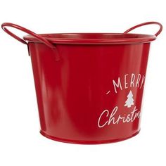 a red metal bucket with merry christmas written on it