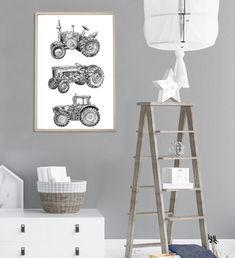 a room with a ladder, chair and pictures on the wall above it is an old fashioned tractor