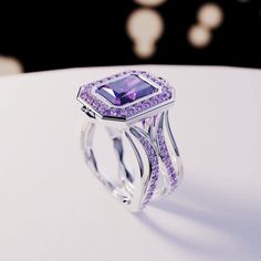 Introducing The Violet Crown: This bold statement ring is perfect for any occassion. As a gift for her, a wedding ring or a gift for yourself - because you deserve it - it is guaranteed to impress. A bold and beautiful simulated amethyst sits like a crown in the center of a gemstone halo. The sides covered with beautiful simulated diamonds and purple enamel. Underneath you have premium quality silver with 4 layers of platinum for lasting durability and shine. With it's bold yet classical design Crown Emerald, Purple Wedding Rings, Violet Crown, Expensive Jewelry Luxury, Blood Diamond, Classical Design, Meaningful Jewelry, Expensive Jewelry, Ethical Jewelry