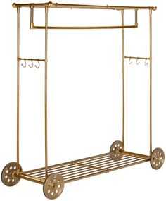 a gold metal garment rack with wheels