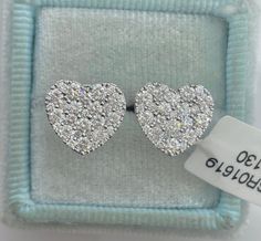 Beautiful Heart Diamond Stud Earrings White Gold. Excellent craftsmanship, the diamonds are very sparkling. Very pretty heart shaped earrings. Sits nice and flat on the ear. The diamonds are set close together, no gaps between the diamonds. The backings have two notches for a secure fit. These diamond earrings are simply classy and beautiful. Heart measures about 10.2 x 11.1mm. These earrings are nice size, not too big or small. Give the gift of love with these stunning earrings. Genuine natural Luxury Heart-shaped Diamond Earrings, Luxury Heart-shaped Brilliant Cut Earrings, Heart-shaped Diamond Earrings With Accents For Valentine's Day, Double Heart Diamond Earrings For Anniversary, Luxury Heart-shaped Diamond Earrings For Wedding, Luxury Heart-shaped Diamond Cut Earrings, Anniversary Double Heart Diamond Earrings, Valentine's Day Heart-shaped Diamond Earrings With Accents, Luxury Heart Cut Earrings With Diamond Accents