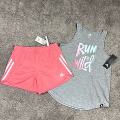 New With Tags! Adorable Adidas Girls L Outfit. Grey Racer Back Tank With Run Wild In Ombre Font With Matching Coral Drawstring Shorts. This Is Such A Great Outfit For Any Activity! It's Sporty And Classic! Msrp: $45.00 High Quality Adidas Outfit Very Quick Shipper! Spring Adidas Cotton Activewear, Pink Casual Activewear For Summer, Casual Sleeveless Adidas Activewear, Summer Casual Pink Activewear, Casual Summer Pink Activewear, Casual Pink Summer Activewear, Casual Pink Adidas Activewear, Pink Cotton Sportswear Activewear, Playful Pink Activewear For Workout