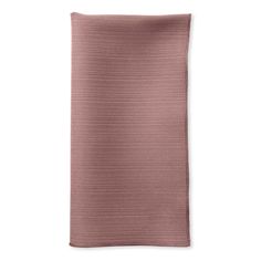 a pink napkin on a white background