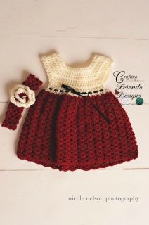 a crocheted dress and matching hat for a baby girl