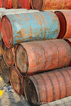 several large metal barrels stacked on top of each other