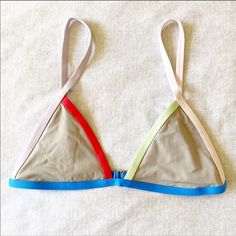 Tavik Jett Triangle Bikini Top Color Blocked Sand Nwt New With Tags Never Worn Size Small 80% Nylon 20% Spandex Tvk-Wtab1603 Made In Usa Rn 140698 Fitted Triangle Swimwear With Built-in Bra, Stretch Nylon Swimwear With Color Block, Stretch Nylon Color Block Swimwear, Color Block Stretch Nylon Swimwear, Multicolor Triangle Top Swimwear With Color Block, Color Block Triangle Top Swimwear For Sunbathing, Multicolor Triangle Top Color Block Swimwear, Color Block Triangle Top Swimwear, Sporty Multicolor Triangle Top Swimwear