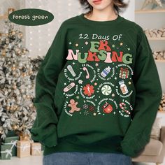 "Christmas Nurse Sweatshirt,Xmas Winter Nurse Crew, 12 Days Of Nursing Hospital Christmas New Year Party, Shirts For team group Nicu Picu Ed Er Welcome to Macievision Shop! I am so happy to see you here. HOW TO ORDER 1. Select the shirt 𝗦𝘁𝘆𝗹𝗲 2. Select the 𝗦𝗶𝘇𝗲 3. Select the shirt color 4. Select the quantity, 5. Click 𝗔𝗗𝗗 𝗧𝗢 𝗖𝗔𝗥𝗧. If you want to buy more than one, please go back to the listing and repeat the steps. \"If you have any question, please send us a message.\" BRAND If you want a specific brand, please send us a message right after you place the order. Otherwise, we will send you the t-shirt according to what we have in stock. SIZE CHART We suggest you choose the size you usually wear. They are true to size. CARE INSTRUCTIONS Turn the sweatshirt inside out befo Green Long Sleeve T-shirt For Holiday, Green Christmas Crew Neck Sweatshirt, Green Christmas Sweatshirt With Letter Print, Christmas Green Sweatshirt With Graphic Print, Christmas Green Graphic Print Sweatshirt, Hospital Christmas, Sweater Drying Rack, Nurse Sweatshirt, New Year Party