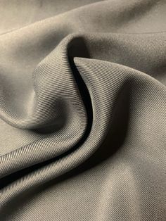 a close up view of the fabric in grey