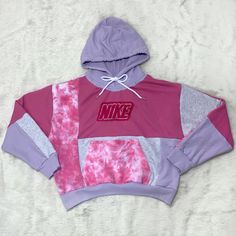 reworked one of a kind Nike patchwork hoodie sweats upcycled sustainable streetwear thrift flip eco friendly shopping fashion pink tie dye lavender Thrifted Hoodies, Upcycled Hoodies, Reworked Sweater, Sustainable Streetwear, Dope Sweaters, Upcycle Fashion Diy, Upcycled Hoodie, Reworked Hoodie, Reworked Sweatshirts