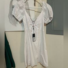 The Cutest Baby Doll Dress, Brand New W Tags! Originally 129 White Puff Sleeve Dress With Tie Back, White Short Sleeve Mini Dress With Tie Back, White Lined Mini Dress With Short Sleeves, White Short Sleeve Lined Mini Dress, Black Turtleneck Midi Dress, Poka Dot Dress, Silk Yellow Dress, Turtleneck Midi Dress, Dolly Dress