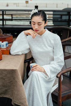 Bach Ngan A-line Flare Sleeved Synthetic Silk Floor Length Ao Dai - MEAN BLVD Fitted Silk Ao Dai With Long Sleeves, Elegant Silk Ao Dai With Long Sleeves, Fitted Silk Long Sleeve Ao Dai, Elegant Silk Long Sleeve Ao Dai, Silk Long Sleeve Ao Dai, Mean Blvd, Flare Sleeves, Mesh Laundry Bags, White Patterns