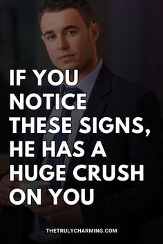 a man in a suit and tie holding a cell phone with the quote if you notice these signs, he has a huge crush on you