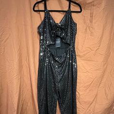 This Jumpsuit From Valfre Has A Front Cut-Out, Cropped Length, Sequin Detailing, And A V-Neckline. Size: 2xl Material: 100% Condition: New W/ Tags Retail: $111.95 Measurements: Upon Request Disco Style Jumpsuits And Rompers For Party Season, Black Jumpsuits And Rompers For Holiday Party, Black Jumpsuits And Rompers For Party Holiday, Black Jumpsuit For Holiday Party, Sleeveless Disco Jumpsuit For Night Out, Sequin Jumpsuits And Rompers For Costume Party, Sequined Jumpsuits For Costume Parties, Sequin Jumpsuits For Costume Party, Metallic Sleeveless Jumpsuit For Night Out