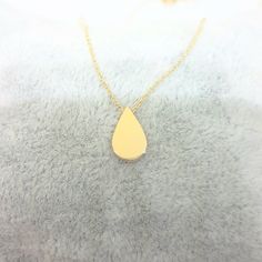 -The tear drop design women jewelry pendant necklace is made with high quality 14K real solid gold. - We recommend you to review our other bracelets and necklaces. We have listed many kinds of beautiful and trendy gold and silver products. You won't regret! https://www.etsy.com/shop/LatikaJewelryShop - This cute, charm, dainty, delicate, elegant, and trendy women jewelry pendant necklace has been artfully designed for timeless yet modern millennial fashion. and you can order in three different c Gold Drop Necklace For Gift, Gold Pear-shaped Drop Necklace For Gift, Minimalist Pear-shaped Necklace For Gift, Gold Drop Charm Necklaces For Gift, Gold Teardrop Charm Necklace For Gift, Minimalist Teardrop Charm Necklaces For Anniversary, Minimalist Teardrop Charm Necklace For Anniversary, Gold Teardrop Drop Necklace For Gift, Teardrop Clavicle Chain Necklace As Gift