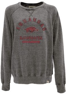 PRICES MAY VARY. Blue84 fan favorite Arkansas Razorbacks women's apparel crewneck sweatshirt This Arkansas women's v notch raglan sleeve crewneck sweatshirt has a high quality vintage distressed screenprint graphic perfect for any Razorbacks fan that is designed and printed in the USA Each Arkansas Razorbacks crewneck sweatshirt is made from a comfortable washed burnout fabric that is a perfect weight for gamedays or cruising the town showing off your Razorbacks pride Great addition to any Arkan Fall Crew Sweatshirt For Fan Merchandise, Casual University Logo Sweatshirt For Fall, Fall Fan Gear Sweatshirt With Crew Neck, Relaxed Fit Long Sleeve Fan Gear Sweatshirt, Relaxed Fit Long Sleeve Sweatshirt For Fans, University Logo Cotton Sweatshirt Fan Gear, University Logo Cotton Sweatshirt For Fan Gear, University Logo Cotton Sweatshirt For Fans, Winter University Logo Cotton Sweatshirt