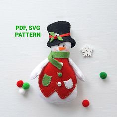 a snowman ornament made out of felt