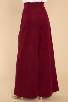 When you have to choose between "those" drab dress pants and these polished burgundy wide leg pants - I know you will choose the latter! You are always Keeping It Classy, in the office and beyond! These pants feature a paper bag style waistline, an adjustable belt, a zipper closure, and very flowy legs. Model is wearing an x-small. • 97% Polyester, 3% Spandex • Hand Wash Cold • Unlined • Imported Burgundy Wide Leg Pants, Burgundy Corduroy Pants, Office Pants, Red Dress Boutique, Keep It Classy, Bag Style, Adjustable Belt, Corduroy Pants, Boutique Dresses