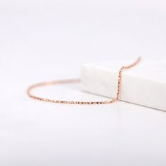 "Thick Raso Chain Bracelet, Gold Chain Bracelet, 14K Solid Gold Bracelet, Simple Chain Bracelet, Layering Jewelry ≫ Product Details ◈ Handmade / Handcrafted Fine Jewelry ◈ Thickness: 1.00mm ◈ Metal: Solid 14K Gold ◈ Gold Color: White gold, Rose gold, Yellow gold ◈ Chain Length: 6\" ~ 7.5\" ≫ Please read our FAQ below for more detail." Classic Rose Gold Box Chain Bracelet, Rose Gold Link Bracelet With Adjustable Chain, Rose Gold Chain Bracelet For Formal Occasions, Rose Gold Link Jewelry With Curb Chain, Elegant Rose Gold Curb Chain Bracelet, Rose Gold Link Chain Bracelet With Adjustable Chain, 14k Gold Link Bracelet With Delicate Chain, Delicate Rose Gold Adjustable Chain Bracelet, Delicate Adjustable Rose Gold Chain Bracelet