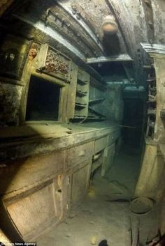 the inside of an old, run down tunnel