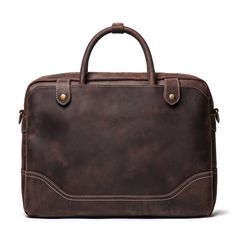 Elevate your professional game with The Everyday Briefcase, a sleek and timeless companion designed for daily office use. Crafted from genuine buffalo leather, this full-grain marvel seamlessly blends classic aesthetics with a modern touch. With its robust construction, it's not just a briefcase; it's a lasting investment. The Everyday Briefcase boasts two side pockets, an interior laptop compartment with a zipper pocket, and features durable brass hardware, YKK zippers, and runners. Customize y Vintage Laptop Bag, Briefcase For Men, Leather Laptop, Buffalo Leather, Vintage Canvas, Genuine Leather Bags, Leather Briefcase, Shoulder Messenger Bag, Leather Items