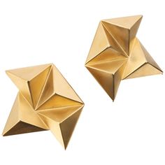 Vintage 1980's Givenchy gold tone statement clip on earrings. Finely brushed matte gold tone finish. Three dimensional design of four 3D pyramids. These rare earrings measure approximately 2.5" in length and 2.25" wide. Earrings are raised approximately 0.5" from earlobe when worn. Back of earrings have brushed geometric pattern and are signed "GIVENCHY" and "Paris New York" on each earring. Back cushions are included and removable if desired. 3d Pyramid, Givenchy Earrings, 80s Earrings, Vintage Gold Earrings, Vintage Clip Earrings, Gold Jewelry Earrings, Vintage Clip, Fashion Jewelry Earrings, Geometric Jewelry