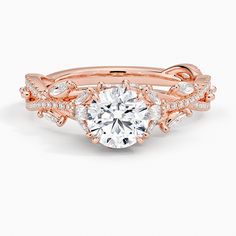 a rose gold engagement ring set with an oval center stone surrounded by round brilliant cut diamonds