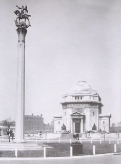 an old black and white photo of a monument