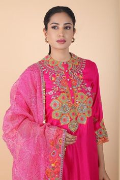 Magenta kurta with floral bloom embroidery. Paired with a contrast dhoti pant and dupatta with prints and embroidered border. - Aza Fashions Wedding Churidar With Diwali Motifs, Bollywood Wedding Palazzo Set With Motifs, Silk Sets With Motifs For Diwali, Festive Chanderi Palazzo Set With Motifs, Designer Motif Palazzo Set For Diwali, Bollywood Palazzo Set With Straight Kurta And Motifs, Anarkali Palazzo Set With Motifs For Navratri, Designer Diwali Palazzo Set With Motifs, Bollywood Style Palazzo Set With Straight Kurta