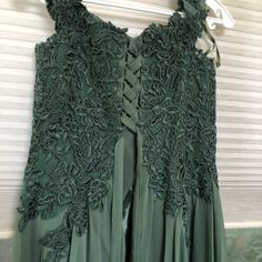 Beautiful Formal Olive Green Gown, Never Worn, Without Tags. Size M. Laces Up The Back. 100% Polyester. Olive Green Gown, Green Formal Gown, Green Gown, Formal Gown, Formal Gowns, The Back, Olive Green, Wedding Dresses, Lace Up