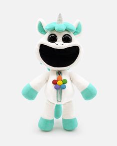 a small stuffed animal with horns on it's head and eyes, wearing a white suit