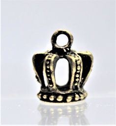 3D Crown Charms, These crowns are very intricate. They would make an excellent gift. Take a look at them. The pieces are available in gold, silver and bronze and are very detailed. They are small, adorable, highly detailed and can be used for all kinds of DIY crafts and projects. These charms can also be used to dress up other objects like: key chains, jewelry, zippers, and other items. They are very easy to apply. This is a great way to make yourself have a unique look all your own. Unique Handmade Gold Charms, Antique Gold Charms For Gifts, Gold Antique Charms For Gifts, Antique Brass Charms For Gifts, Handmade Gold Charms For Crafting, Vintage Gold Jewelry With Crown Design, Princess Charming, Crown Princess, Make Yourself