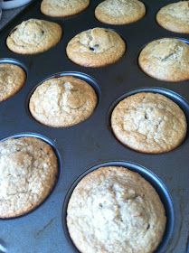 freshly baked muffins sitting in the pan ready to be eaten by someone else