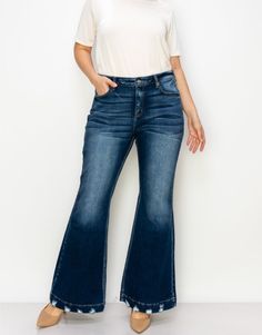 Embrace vintage vibes with ARTEMIS VINTAGE Mid Rise Flare Jean. These dark wash jeans feature a unique distressed hem for that extra touch of style. With a mid rise fit and luxurious stretch, they're both comfortable and chic. Perfect for spicing up any outfit.PRODUCT SPECIFICATIONS*Wide Hem with Distressed Detail*Mid-Rise Stretch Denim*Dark Stone Wash*Front Rise: 12 1/2", Inseam: 32.5"*Brand: Artemis Vintage*Online Only Mid Rise Flare Jeans, Kimono Duster, Chunky Beads, Duster Cardigan, End Of Season Sale, Floral Chiffon, Dark Wash Jeans, Wash Jeans, Vintage Vibes