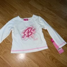 2t Pink Stitching No Stains No Rips Nwt Selling Because It’s To Small On My Daughter Glitter And Sequence B For Barbie Perfect To Wear For The New Barbie Movie White Long Sleeve T-shirt For Playtime, Fitted Long Sleeve Tops For Playwear, The New Barbie Movie, Sublimation Ideas Projects Inspiration, Barbie Top, New Barbie, Barbie Movie, Barbie Vintage, Barbie Movies