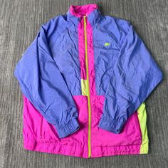 Vintage 90s Nike Elite Two Pocket Sportswear Windbreaker Style 1990s Fashion Multi Color Zip Up Light Jacket Large Mens Condition:  Excellent Used Condition  = No Flaws Measurements: Please see photos above for all measurements IF YOU BUY TWO OR MORE ITEMS USE THE CODE BUNDLE @ CHECK TO SAVE 20% WE SHIP WITHIN 24 HOURS AFTER PURCHASE! Please be aware that we do not offer free returns!! The Buyer is responsible for the cost of the return label.  Follow us on TikTok & Instagram @findsnostalgic and 90s Windbreaker For Outdoor Activities, 90s Style Windbreaker For Outdoor Activities, 90s Style Long Sleeve Windbreaker For Outdoor Activities, 90s Style Long Sleeve Windbreaker For Outdoor, Sporty Purple Windbreaker For Outdoor Activities, Casual Purple Nylon Windbreaker, Purple Nylon Casual Windbreaker, Pink Nylon Track Jacket For Streetwear, Casual Purple Track Jacket For Outdoor