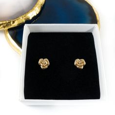 These pretty gold rose stud earrings make the perfect little gift for young or old. Great for a birthday or thank you gift. Dimensions: 0.7cm x 0.7 cm. (Rose excluding pin)Earrings will be delivered in an Aspreys & Clarke Gift box. For that extra special touch you can personalise the gift box. The box lid can be completed with an engraved plaque, allowing you to add a message up to 120 characters in length.This product will be engraved using ‘Georgia’ font unless otherwise stated. Personalized Cocktail Stirrers, Georgia Font, Rose Stud Earrings, Pin Earrings, Sterling Silver Heart Necklace, Engraved Plaque, Silver Heart Necklace, Sterling Silver Heart, Thank You Gifts