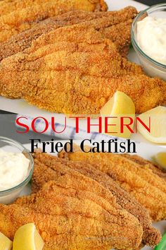 fried fish is served with lemons and sour cream