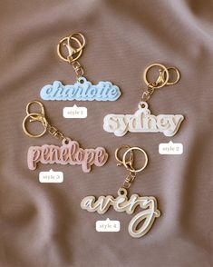 six different keychains with names on them